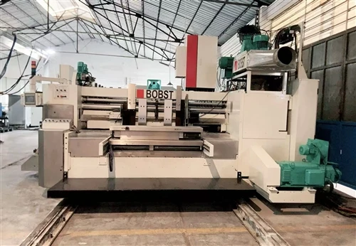 Máquina automática de apilamiento, corte, troquelado, ranurado e impresión fl...